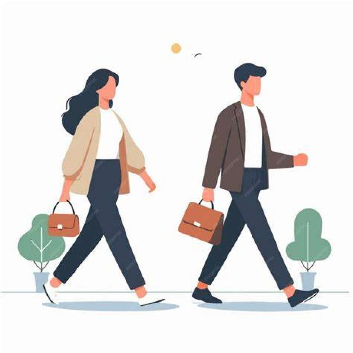 a man and woman walking down the street