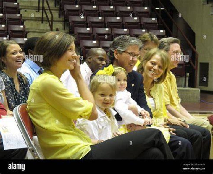 Lisa Kelsey, left, and her two daughters, Ruthie and Carolina, watch as