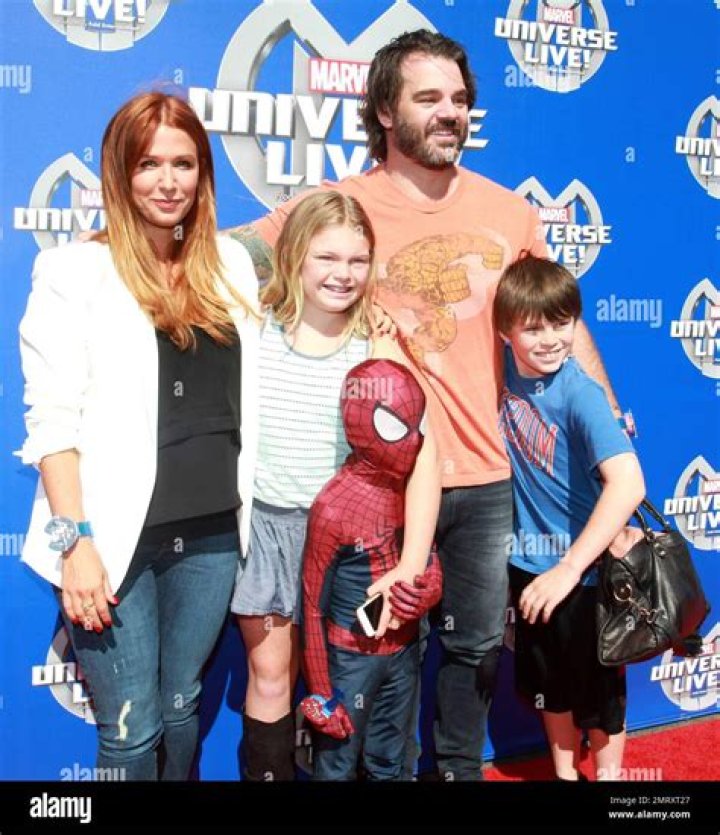 Poppy Montgomery and kids at the World Premiere of BRAVE and the Grand
