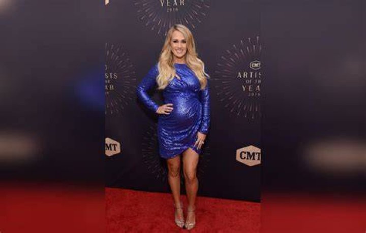 Pregnant CARRIE UNDERWOOD at CMT Artists of the Year 2018 in Nashville