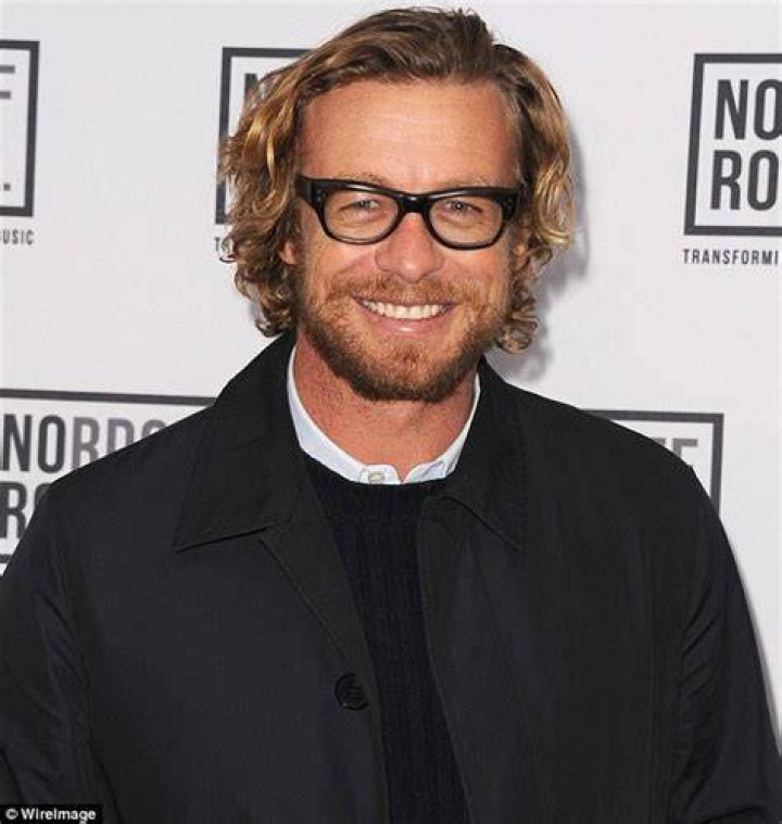 Simon Baker, 45, has still got it as he wears his signature thick