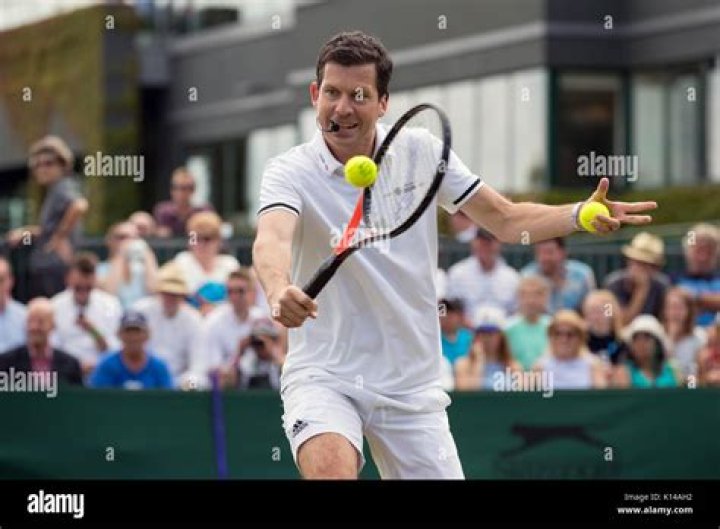 Tennis star Tim Henman and wife Lucy attending a charity ball at the