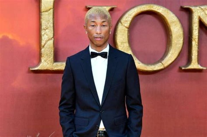 The Lion King Pharrell Williams joined by his wife Helen Lasichanh